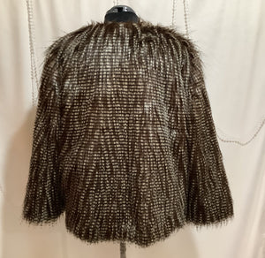 Faux owl feather jacket with coordinating boot toppers is fashion forward and animal rights friendly.